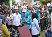 Kejari Way Kanan Hadiri Pencanangan Desa Tapis dan Penyaluran Bantuan TP PKK Provinsi Lampung di Kampung Negeri Baru
